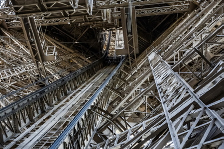 Vue de la tour eiffel, détail de la construction et structure de l'ouvrage en Fer Puddlé avec les rails des chariots de cabine de l'un des ascenseurs historiques toujours en fonctionnement. Centenaire de la mort de Gustave Eiffel le 27 décembre 2023. La Tour Eiffel à Paris haute de 330 mètre construite entièrement en Fer Puddlé et utilisant également la croix de Saint-André, c’est-à-dire en poutrelles métalliques en X, elle à été débutée le 26 janvier 1887.Le 31 mars 1889, la Tour achevée en un temps record -2 ans, 2 mois et 5 jours. Cela fait 100 ans que le prodigieux ingénieur originaire de Dijon est décédé. Le 27 décembre 1923 Gustave Eiffel rendait son dernier souffle à l’âge de 91 ans.

View of the Eiffel Tower, detail of the construction and structure of the Puddled Iron work with the rails of the carriages of one of the historic elevators still in operation. Centenary of the death of Gustave Eiffel on December 27, 2023. The Eiffel Tower in Paris, 330 meters high, built entirely of Puddled Iron and also using the Saint-André cross, that is to say made of metal X-shaped beams, it was started on January 26, 1887. On March 31, 1889, the Tower was completed in record time - 2 years, 2 months and 5 days. It has been 100 years since the prodigious engineer from Dijon died. On December 27, 1923 Gustave Eiffel took his last breath at the age of 91.

Paris, Paris Centre, Ile de France, Région Ile de France, 75, europe, France.            
